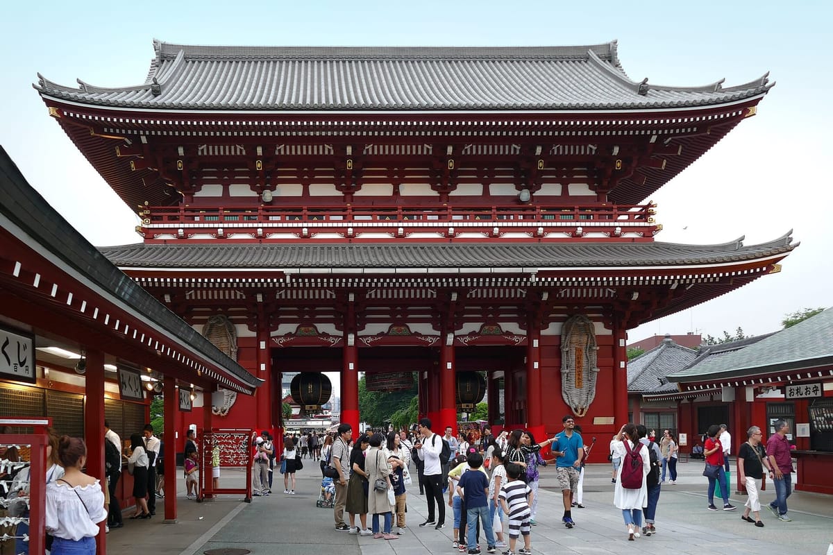 Crowds under the gates of Nakamise-dori on the approach to Senso-ji