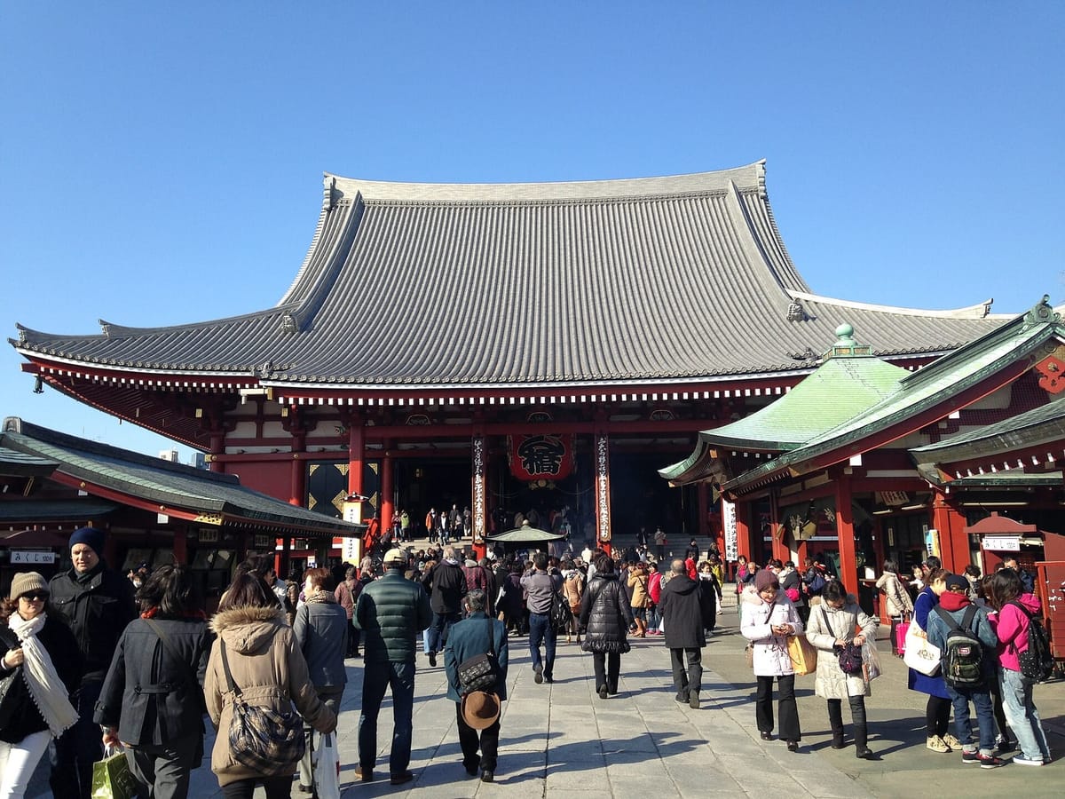 The main hall of Senso-ji seen across the forecourt